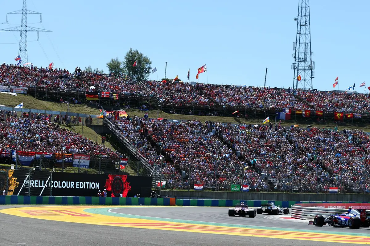 Many people in the stands watching MADRING