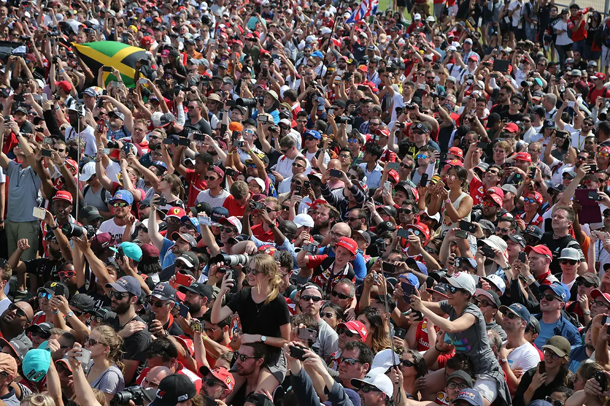 Many people in the stands watching MADRING