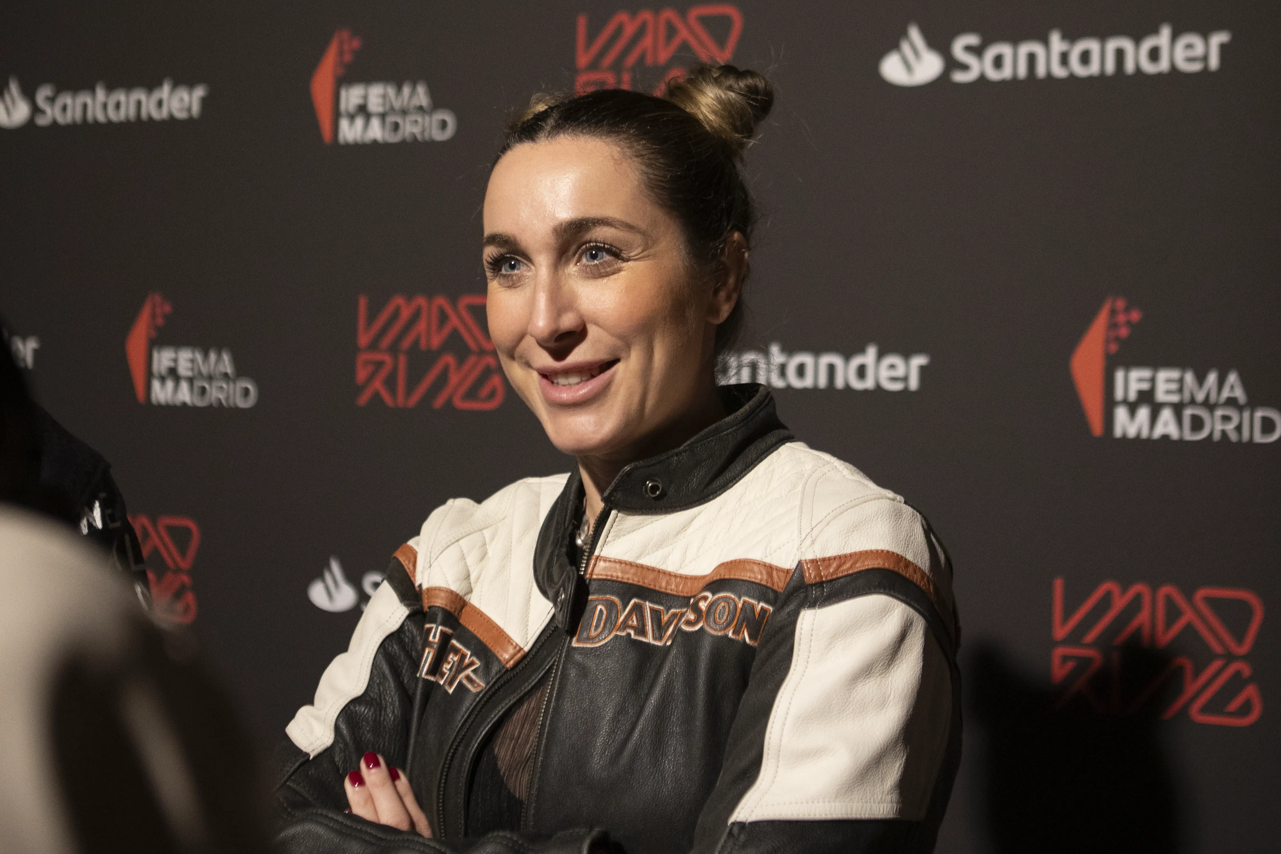 A woman being interviewed at the MËSTIZA festival in MADRING